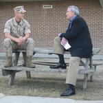 Dan Rather with U.S. Marine Corporal Yerandys Martell-Carrasco