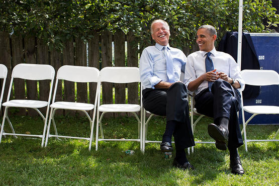 The president and vice president share a laugh before a campaign rally together in Portsmouth, N.H.