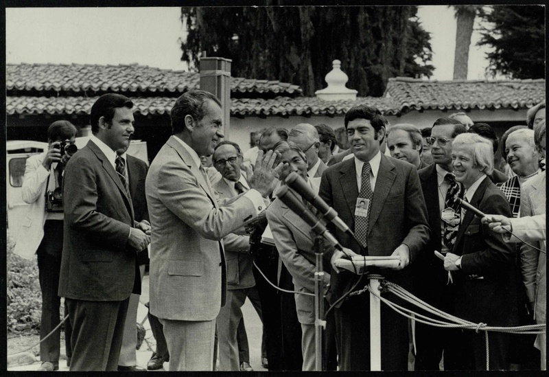 Picture – Nixon talks to the press during his 1972 China trip.